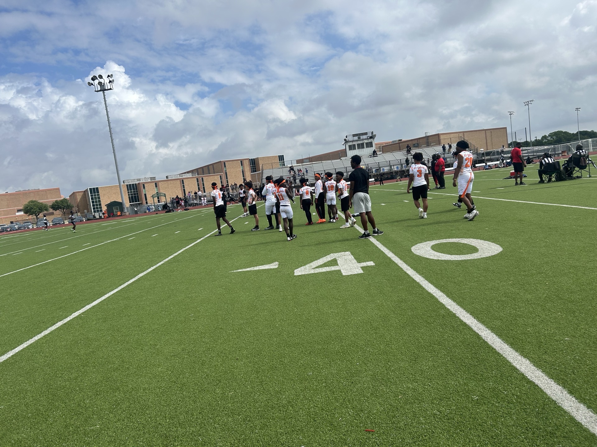 NTX Bengals players spread out on the football field during practice